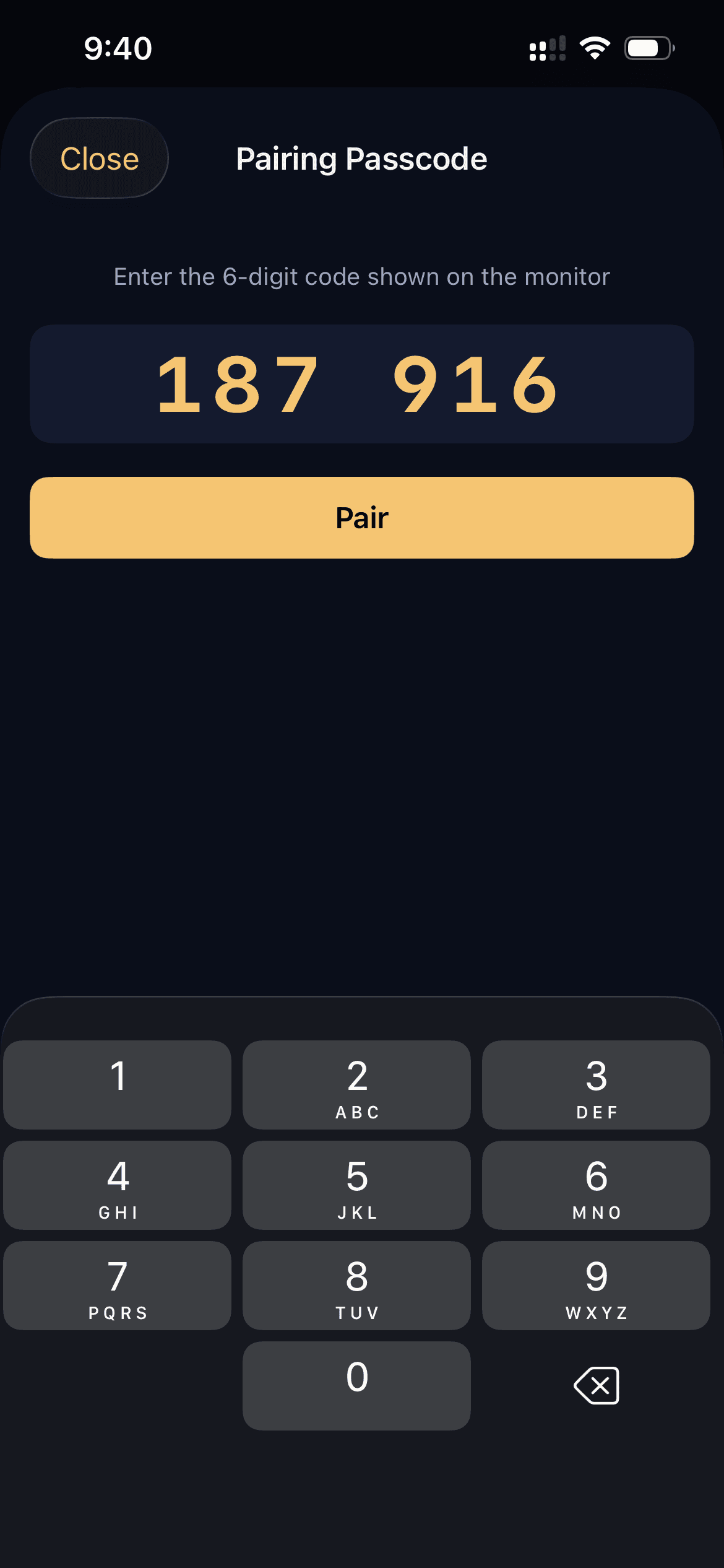 Viewer enters the 6-digit pairing passcode shown on the monitor